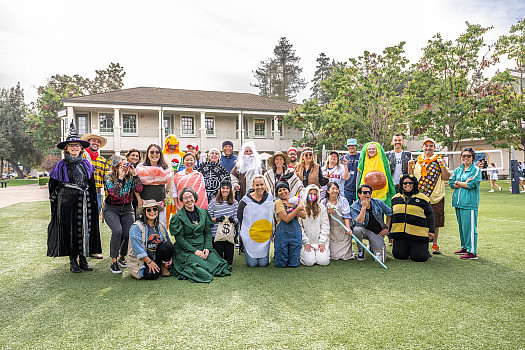 The Middle School faculty and staff pose for a Halloween photo.