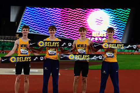 Menlo's Aiden Deffner, from left, Will Hauser, Landon Pretre and Justin Pretre hold a piece of the tape after winning the Oregon Relays 4x800